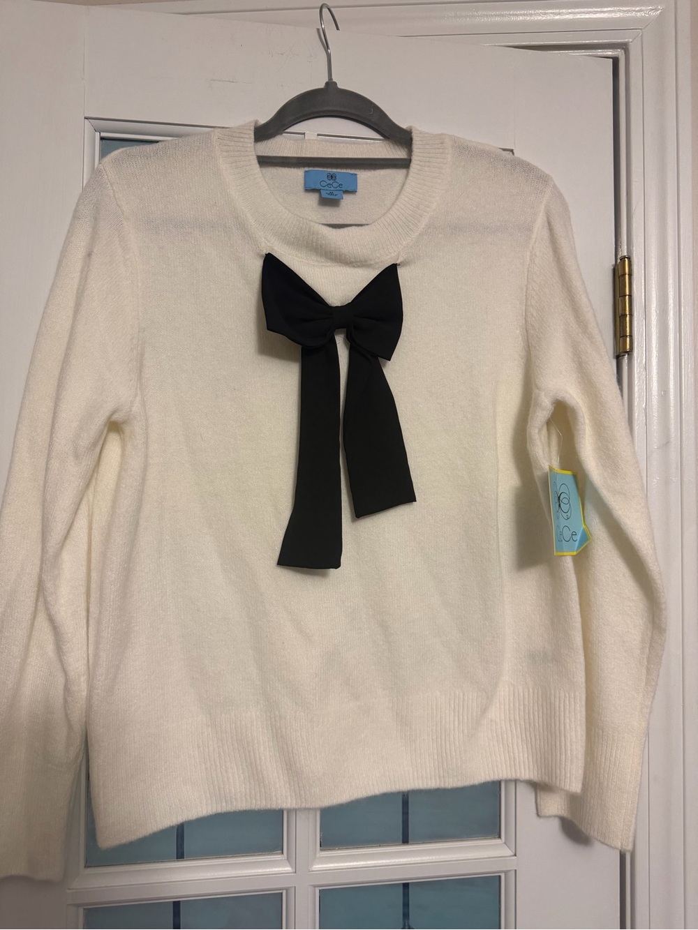 CeCe Cream Crewneck Sweater with Black Bow Accent - Picture 1 of 5